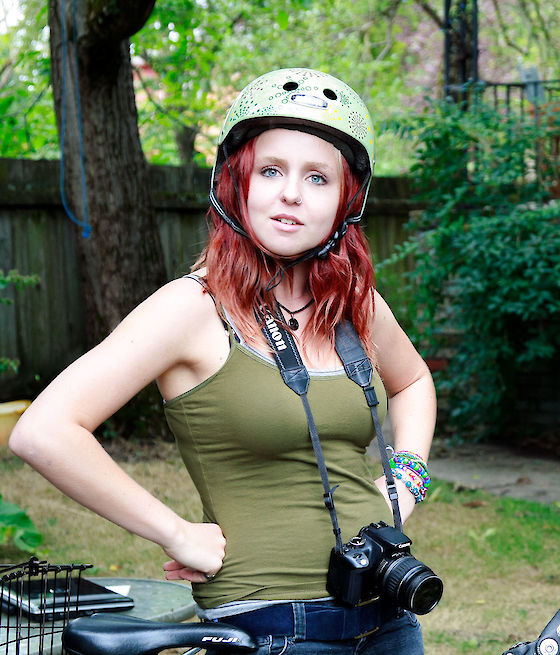 A client of REACH's YouthSave program and what she saved for through it | © Matt Giraud Photography