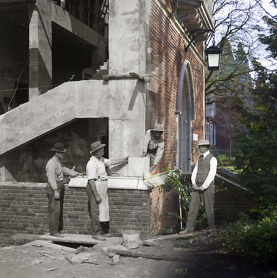 Stonemasons rough in the cornerstone of Eliot Hall before the actual ceremony in May, 1912. | © Matt Giraud Photography