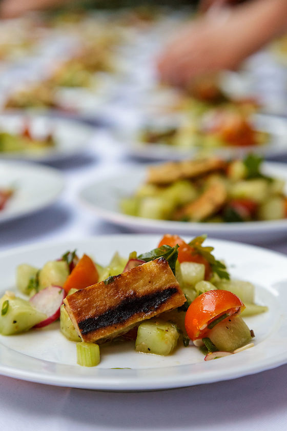 Kasey Mills of Toro Bravo plates at Chef in My Garden | © Matt Giraud Photography